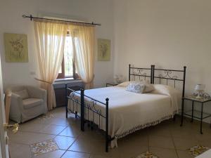 Postel nebo postele na pokoji v ubytování B&B Il Vicolo