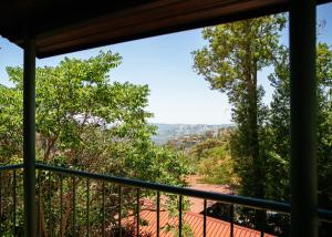 uma vista da varanda de uma casa em Petit Palais Platres Boutique Hotel em Platres