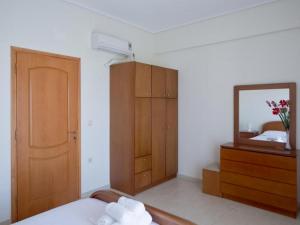 Postel nebo postele na pokoji v ubytování 8 Furnished Apartments in Stoupa for Rent.