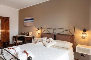 Letto o letti in una camera di TorreVarata - Guest Rooms