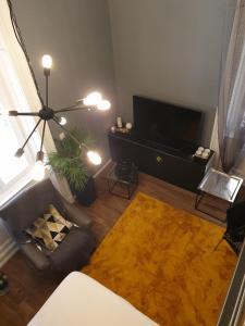 TV a/nebo společenská místnost v ubytování Apartment Sea Promenade - Opatija center