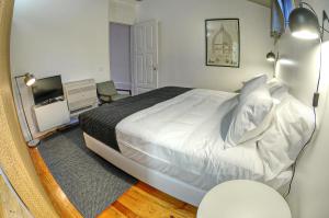 Ένα ή περισσότερα κρεβάτια σε δωμάτιο στο Three Houses & Bedrooms