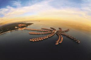an island in the middle of the water at Golden Palm Tree Sepang in Sepang