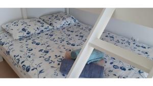 A bed or beds in a room at Joiebre