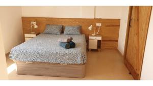 A bed or beds in a room at Joiebre