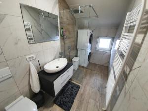 Koupelna v ubytování Apartman Božur ****