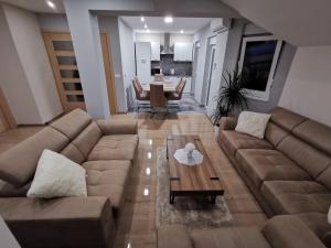 Posezení v ubytování Apartman Božur ****