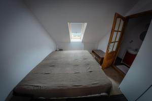 Łóżko lub łóżka w pokoju w obiekcie Siedlisko Matiaszówka