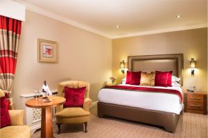 Giường trong phòng chung tại International Hotel Killarney