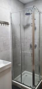 Ванна кімната в Rooms Suite Planetario