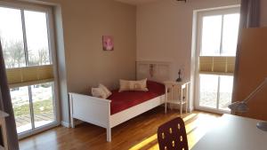 Postel nebo postele na pokoji v ubytování Ferienhaus Wattenmeerblick