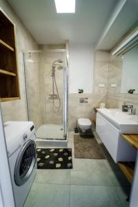 Et badeværelse på Apartament Diamond + 28 billeder