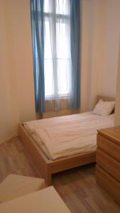 Posteľ alebo postele v izbe v ubytovaní Apartman 4 you