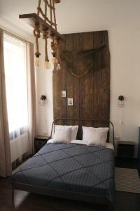 Postel nebo postele na pokoji v ubytování DABA Mini Hotel