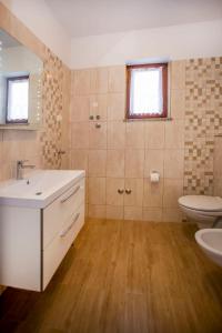 Łazienka w obiekcie Apartmani Dragica