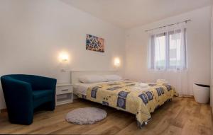 Łóżko lub łóżka w pokoju w obiekcie Apartmani Dragica