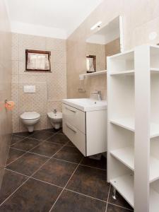 Łazienka w obiekcie Apartmani Dragica