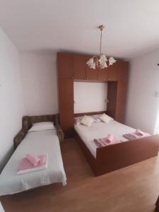 Postel nebo postele na pokoji v ubytování Room Luka
