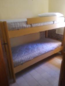 Krevet ili kreveti na kat u jedinici u objektu SCALEA - RIVIERA DEI CEDRI