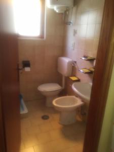 Vonios kambarys apgyvendinimo įstaigoje SCALEA - RIVIERA DEI CEDRI