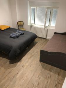 Un pat sau paturi într-o cameră la Chai paulette