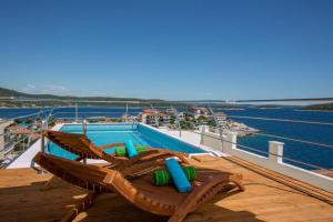 a swimming pool on the deck of a cruise ship at Villa Cerjan - Sevid in Sevid