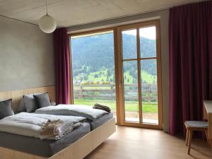 Tempat tidur dalam kamar di Kieferhof