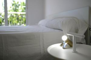 Postel nebo postele na pokoji v ubytování Apartaments Àlex
