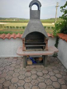 Afbeelding uit fotogalerij van Apartment Viti with garden and barbecue in Funtana