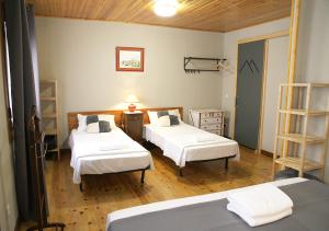 Posteľ alebo postele v izbe v ubytovaní Hostal Fonda Prat