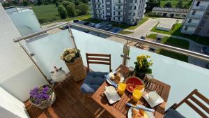 Balkón alebo terasa v ubytovaní Apartament Olsztyński - Lake Apartments, osiedle Calamo Park - Olsztyn