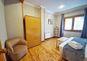 Posteľ alebo postele v izbe v ubytovaní Hostal Fonda Prat