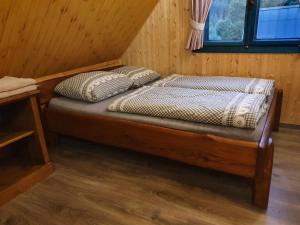 Posteľ alebo postele v izbe v ubytovaní Palčovka - apartmán U Štěpána a U Dorotky