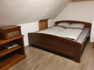 Posteľ alebo postele v izbe v ubytovaní Palčovka - apartmán U Štěpána a U Dorotky