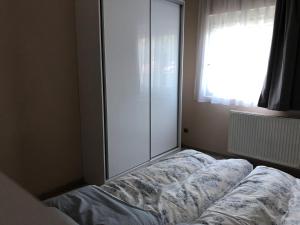 Posteľ alebo postele v izbe v ubytovaní Adam's Apartment