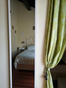 A bed or beds in a room at Mayorazgo De Altamira Mila