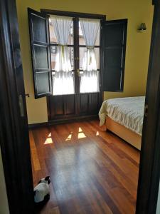 A bed or beds in a room at Mayorazgo De Altamira Mila