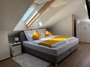 En eller flere senge i et værelse på Ferienwohnung „Otto Lilienthal“