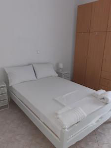 Posteľ alebo postele v izbe v ubytovaní Falopa Apartments