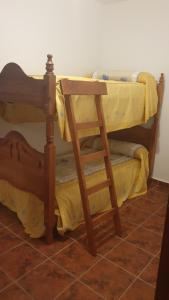 A bed or beds in a room at El Molino de la laguna