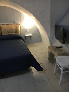 Un pat sau paturi într-o cameră la Casa Cortes