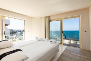 Posteľ alebo postele v izbe v ubytovaní Kahlua Boutique Hotel