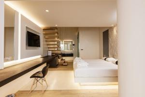 Posteľ alebo postele v izbe v ubytovaní Kahlua Boutique Hotel + 37 fotografií