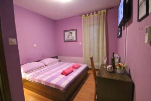 Posteľ alebo postele v izbe v ubytovaní Guest House Vila Micika Dubrovnik