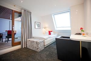 Ein Bett oder Betten in einem Zimmer der Unterkunft Hotel Krone OHG