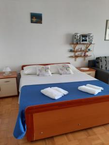 Postel nebo postele na pokoji v ubytování Apartman Ada