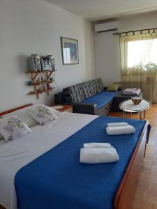 Postel nebo postele na pokoji v ubytování Apartman Ada