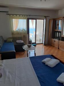Postel nebo postele na pokoji v ubytování Apartman Ada