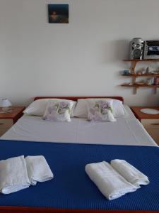 Postel nebo postele na pokoji v ubytování Apartman Ada