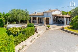 a villa with a view of the house at E323 Moli Den Fanals by Mallorca Villa Selection in Alcudia